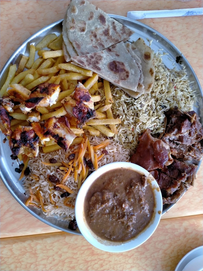 Kenyan meal with vegetables and staple foods